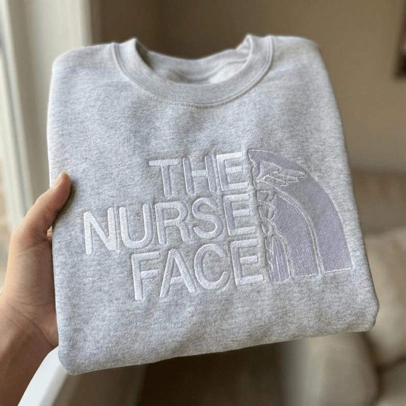 Embroidered “The Nurse Face” Cozy Crewneck - athletic grey - Blue Sky Fashions & Lingerie