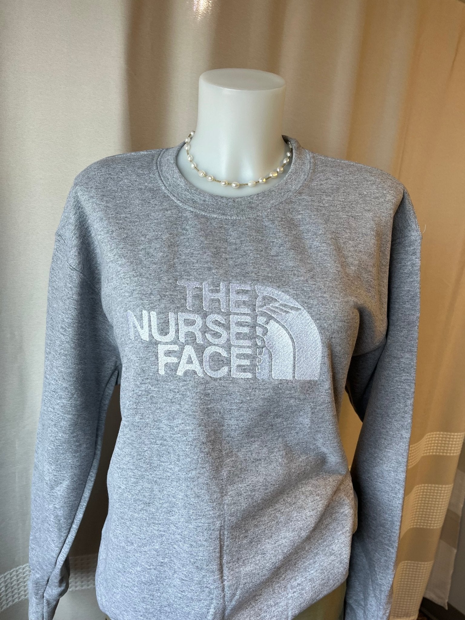 Embroidered “The Nurse Face” Cozy Crewneck - athletic grey - Blue Sky Fashions & Lingerie