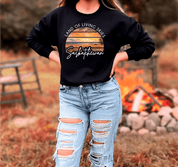 Land of Living Skies Sunset Unisex Crewneck - Black - Blue Sky Fashions & Lingerie