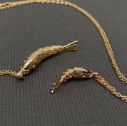 Swinging Tail Fish Charm Gold - Plated Necklace - Blue Sky Fashions & Lingerie
